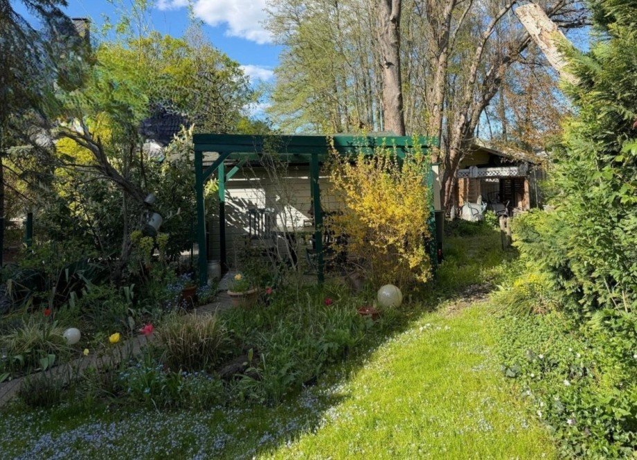 Garten mit Sitzgelegenheit Einfamilienhaus Teichland